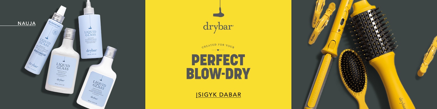 Drybar plaukų priežiūros priemonių rinkinys, įskaitant šampūną, kondicionierių ir serumą, skirtą nepriekaištingam išfėnimui.