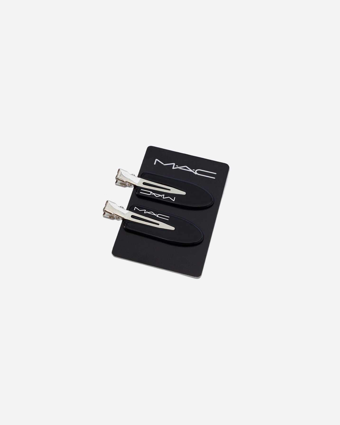 Perkant MAC productų už 89 € ir daugiau – DOVANA MAC plaukų segtukas.