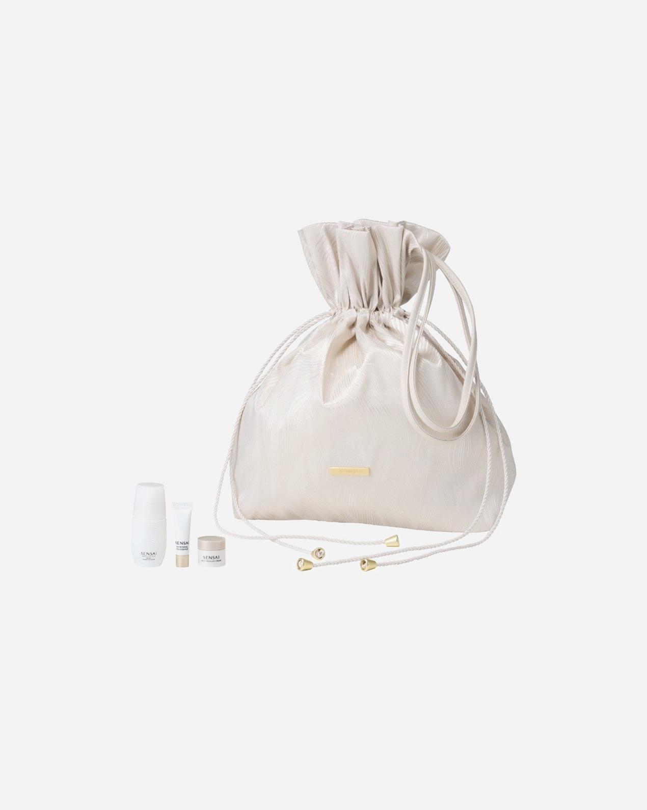 TIK INTERNETE! Perkant 2 ar daugiau SENSAI produktus - DOVANA SENSAI kosmetinė su kelioninės talpos produktais.